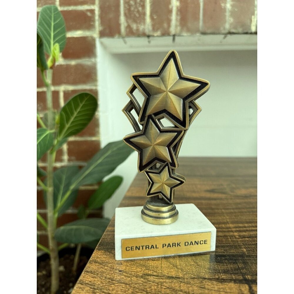 Central Park dance, gold star trophy